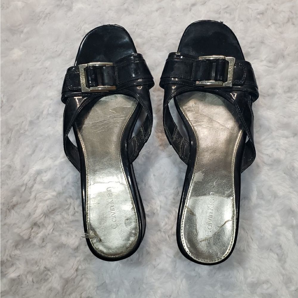 Calvin Klein 7.5 Yanni slide wedge cut out heel